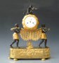 A fine and rare Empire ‘Au Bon Savage’ clock, ‘The Stretcher Bearers’ by Godeby à Paris, circa 1815